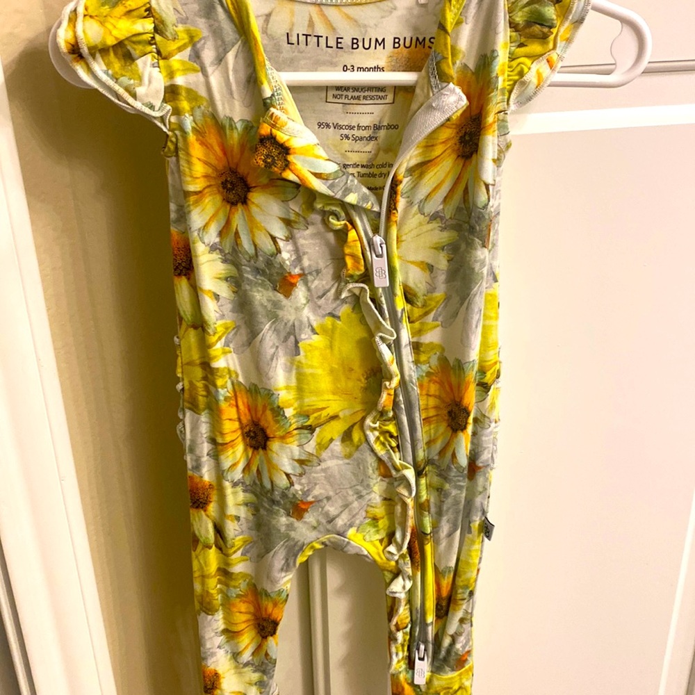 Bums and roses (LBB) ruffled romper.